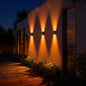 Solar-powered waterproof wall washer light for home, courtyard, garden, and villa decoration; ambient spotlight with adjustable brightness.